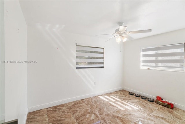 unfurnished room featuring ceiling fan