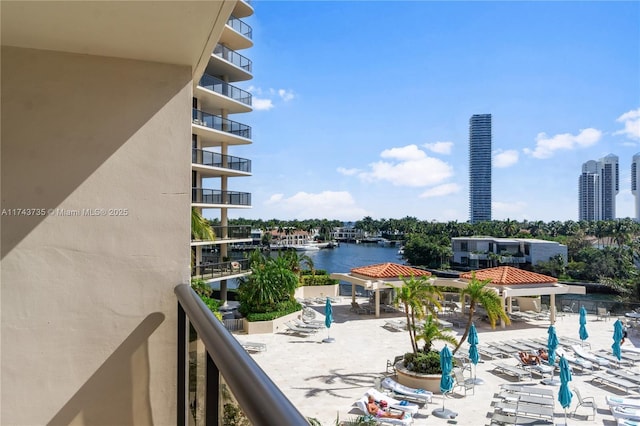 balcony featuring a water view