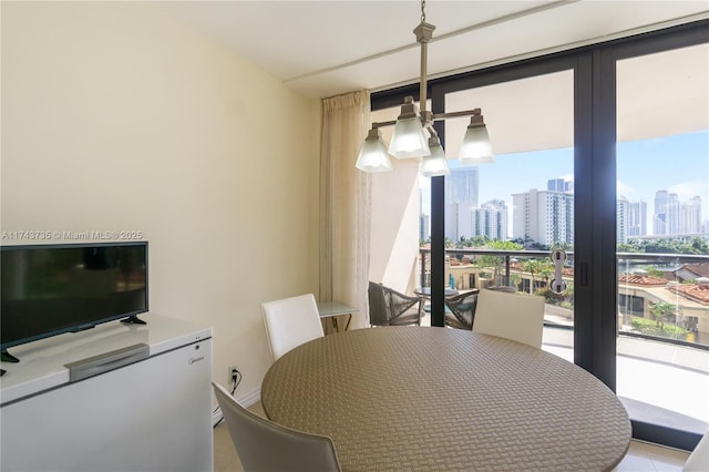 dining space featuring floor to ceiling windows