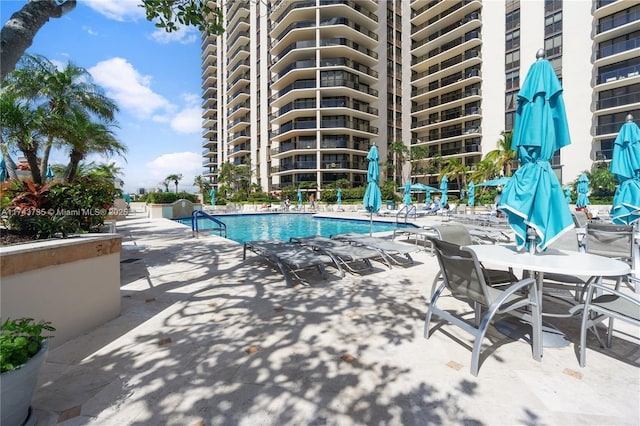 view of pool featuring a patio