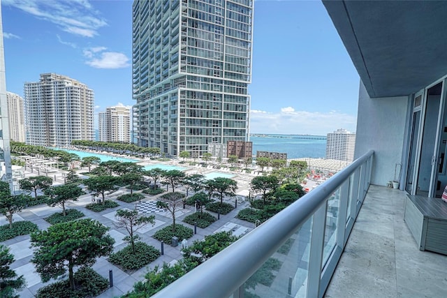 balcony featuring a water view