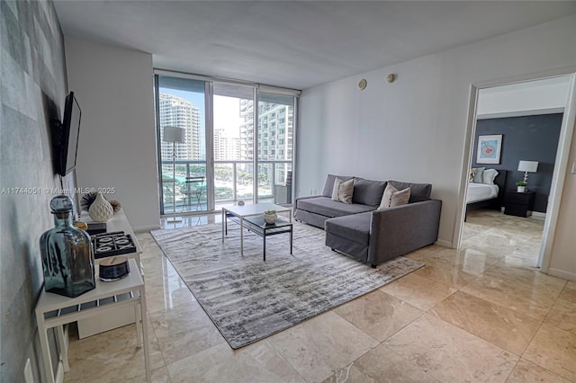 living room with floor to ceiling windows