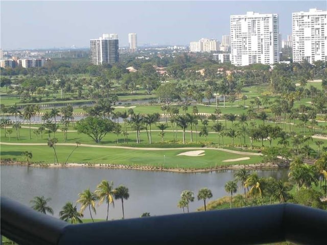 view of home's community featuring a water view and a city view