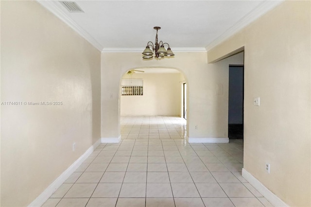 interior space featuring ornamental molding and a chandelier