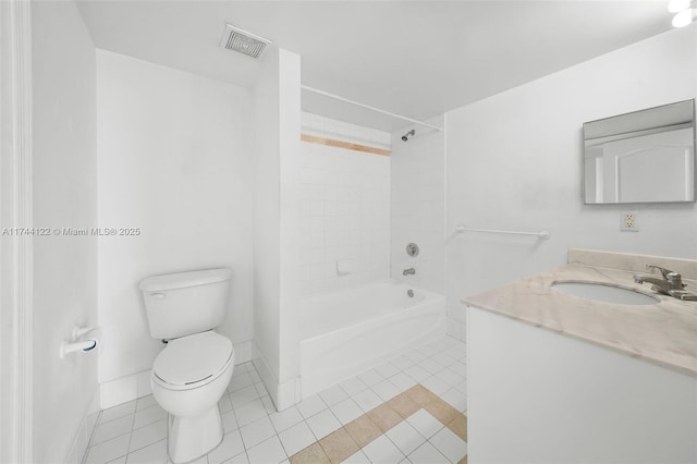 full bathroom with tile patterned floors, toilet, vanity, and tiled shower / bath