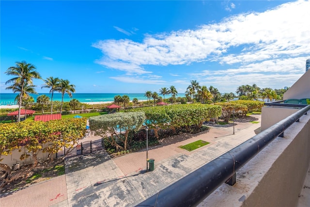 2555 Collins Ave Unit 403, Miami Beach, FL 33140 - view of patio featuring a water view, a gate, and a balcony