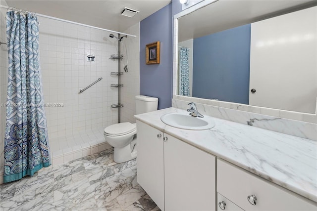 2555 Collins Ave Unit 403, Miami Beach, FL 33140 - bathroom featuring vanity, toilet, a tile shower, and marble finish flooring
