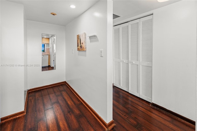 2555 Collins Ave Unit 403, Miami Beach, FL 33140 - corridor featuring hardwood / wood-style floors and baseboards