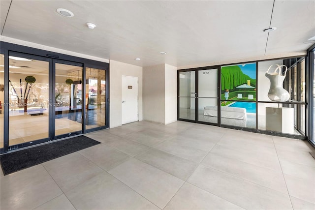2555 Collins Ave Unit 403, Miami Beach, FL 33140 - view of patio featuring french doors