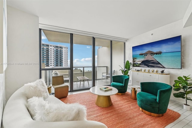 2201 Collins Ave Unit 811, Miami Beach, FL 33139 - living area with a wall of windows
