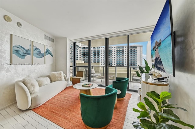 2201 Collins Ave Unit 811, Miami Beach, FL 33139 - tiled living room with plenty of natural light