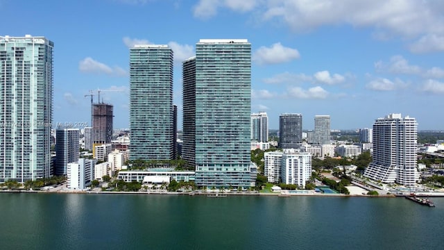 property's view of city featuring a water view