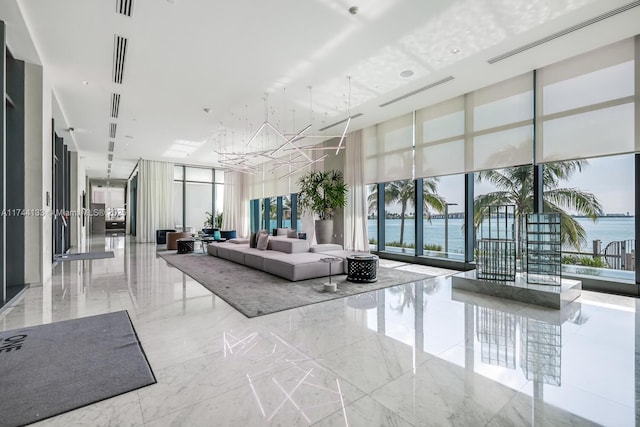 building lobby with a water view and visible vents