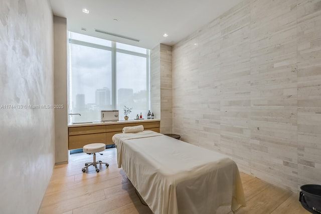 bedroom with light wood-style flooring