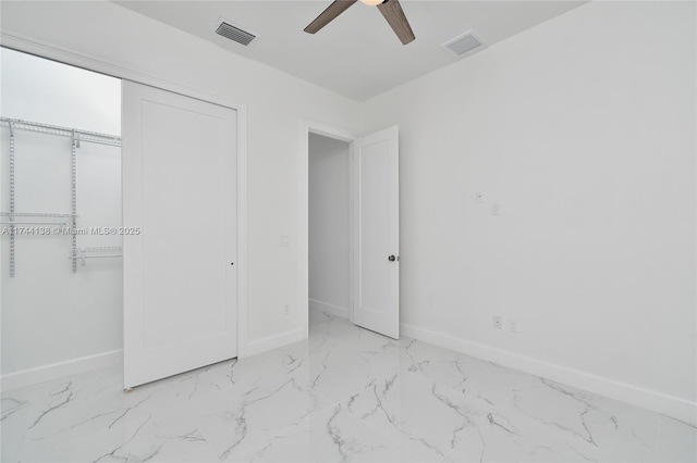 unfurnished bedroom featuring a closet and ceiling fan