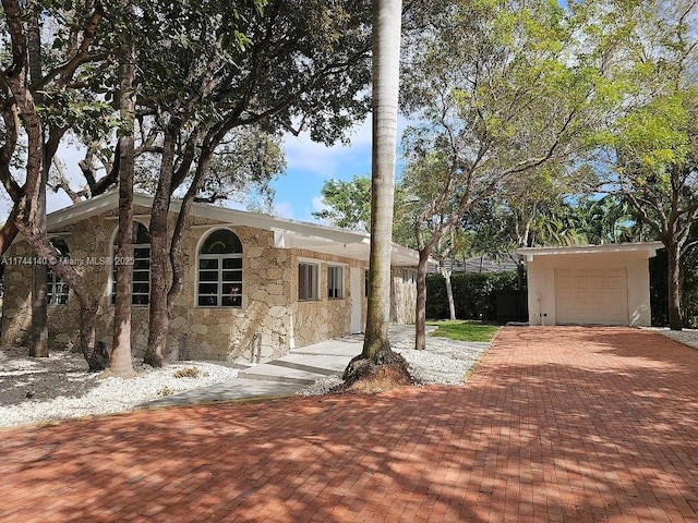 view of front of property with a garage