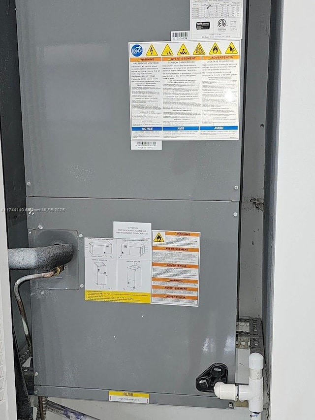 utility room with heating unit