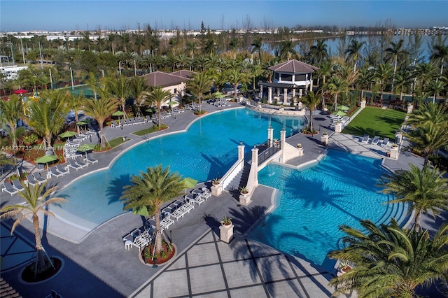 community pool with a patio area