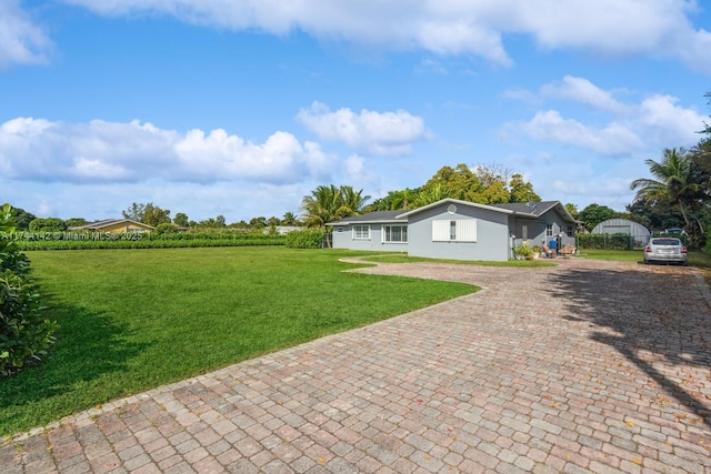 exterior space with decorative driveway