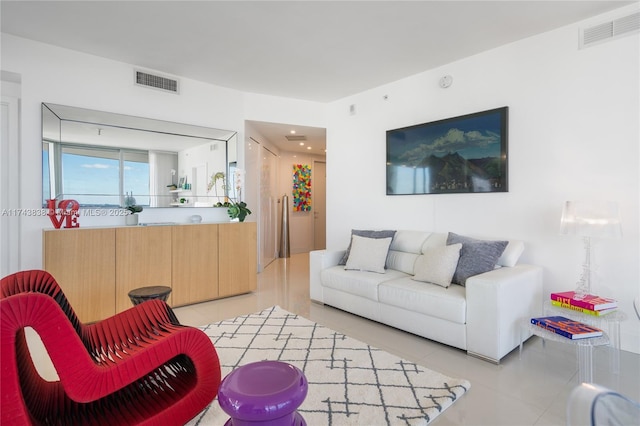 living room featuring light tile patterned flooring