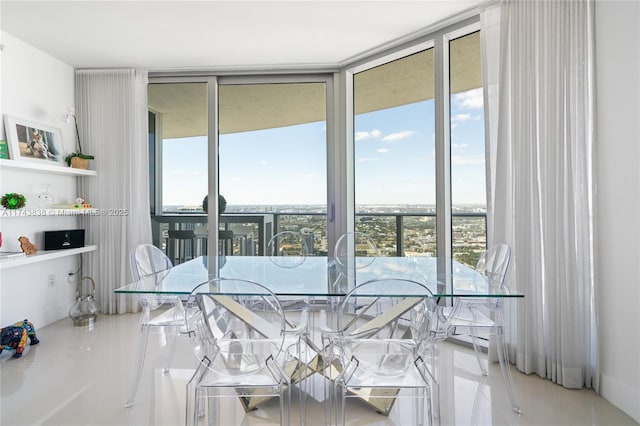 tiled dining space featuring expansive windows and a wealth of natural light