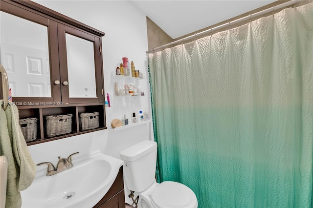 bathroom with vanity, a shower with curtain, french doors, and toilet