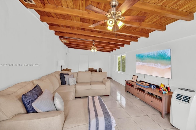 tiled living room featuring beamed ceiling, ceiling fan, and wooden ceiling