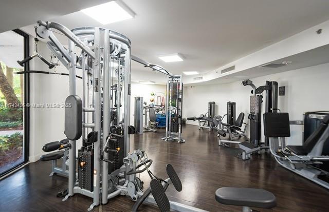 3300 NE 192nd St Unit 111, Aventura, FL 33180 - gym featuring wood finished floors