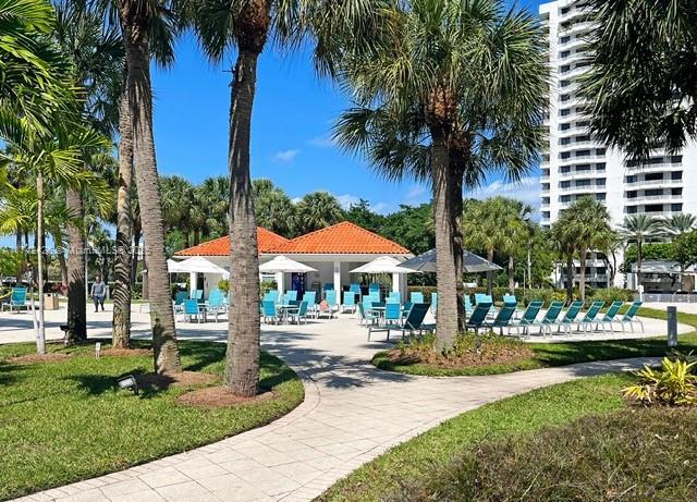 3300 NE 192nd St Unit 111, Aventura, FL 33180 - view of property's community with a yard
