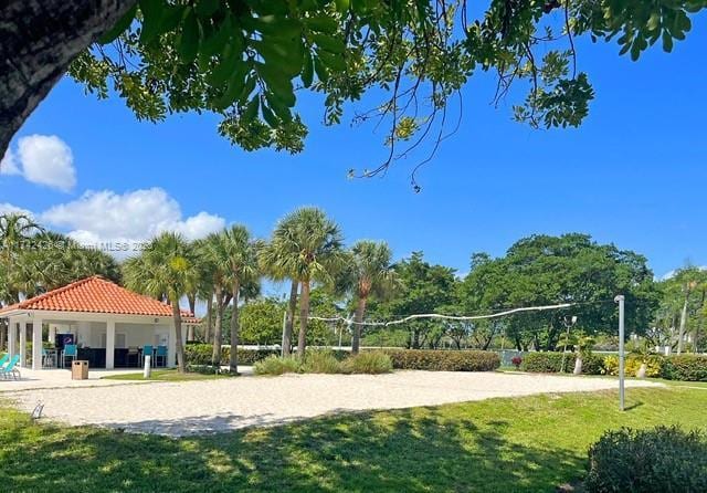 3300 NE 192nd St Unit 111, Aventura, FL 33180 - view of property's community featuring volleyball court, a lawn, and a gazebo