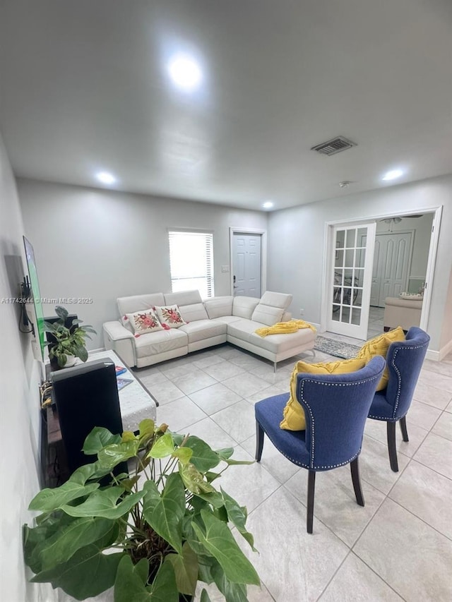 living room with light tile patterned floors