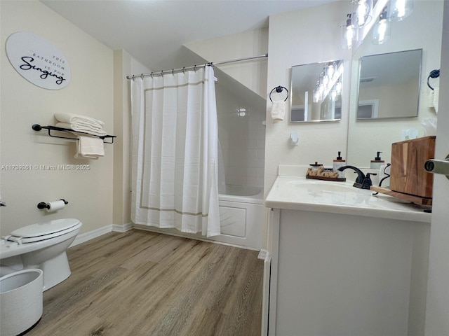 4003 Santa Maria Dr Unit 101, Kissimmee, FL 34741 - full bathroom featuring wood-type flooring, vanity, shower / tub combo, and toilet