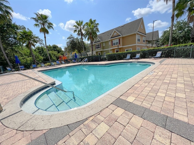 4003 Santa Maria Dr Unit 101, Kissimmee, FL 34741 - view of swimming pool with a patio area