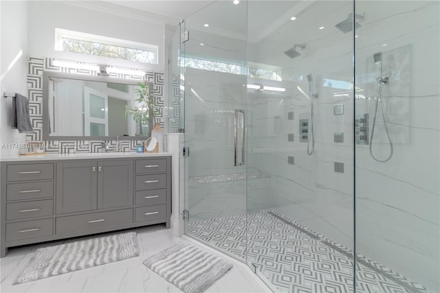 bathroom featuring crown molding, vanity, and a shower with shower door