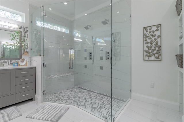 bathroom featuring vanity and a shower with door