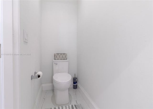 bathroom featuring toilet