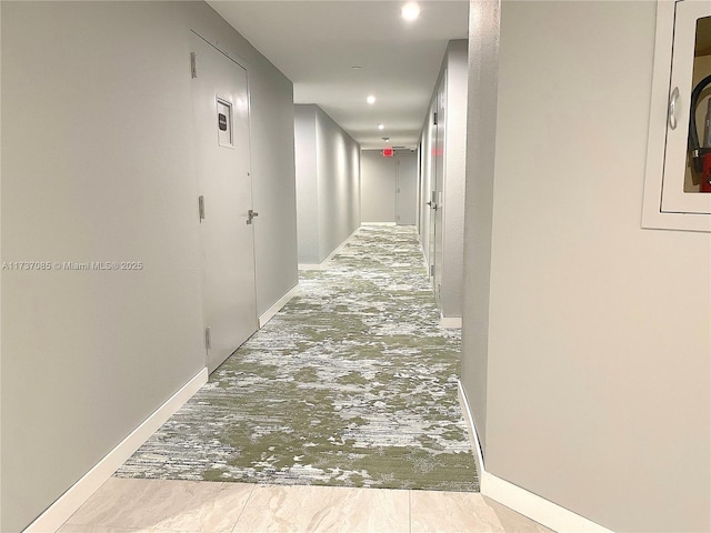 2555 Collins Ave Unit 607, Miami Beach, FL 33140 - hall featuring baseboards and recessed lighting