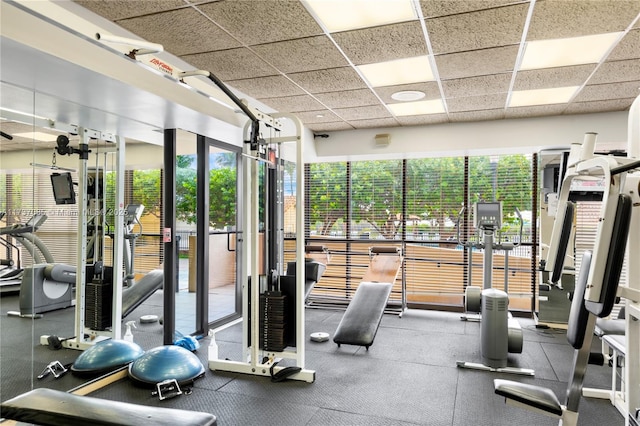 2555 Collins Ave Unit 607, Miami Beach, FL 33140 - workout area with a paneled ceiling