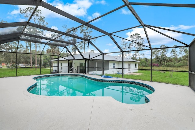 view of pool featuring a lawn, a patio, and glass enclosure