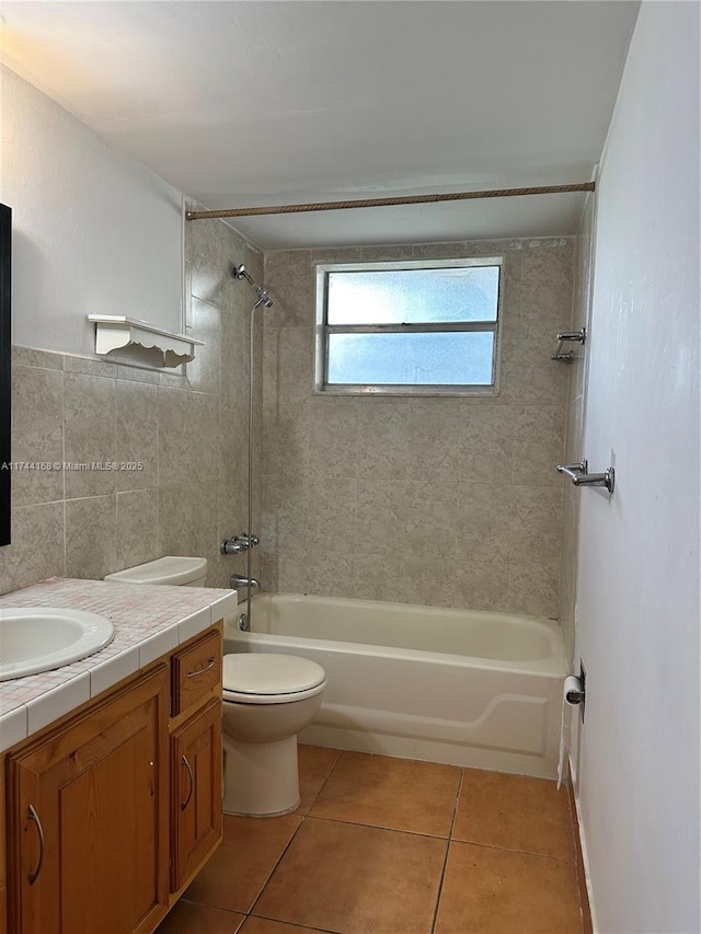 1750 NE 191st St Unit 225-4, Miami, FL 33179 - full bathroom with tile walls, tiled shower / bath combo, vanity, toilet, and tile patterned floors