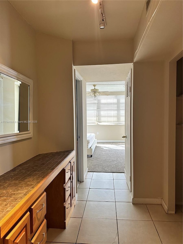 1750 NE 191st St Unit 225-4, Miami, FL 33179 - bathroom with ceiling fan, track lighting, and tile patterned floors