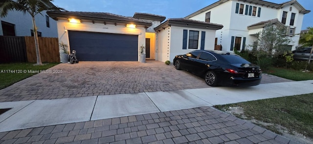 view of front of home with a garage