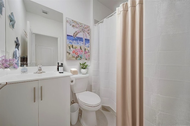 bathroom with visible vents, toilet, and vanity