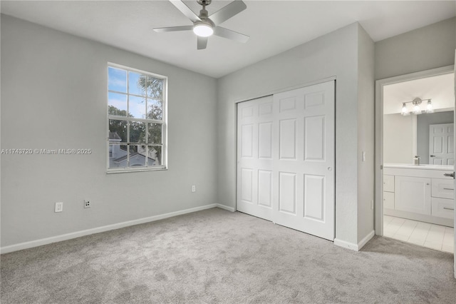 7459 NW 17th Dr, Pembroke Pines, FL 33024 - unfurnished bedroom with carpet floors, a closet, connected bathroom, and a ceiling fan