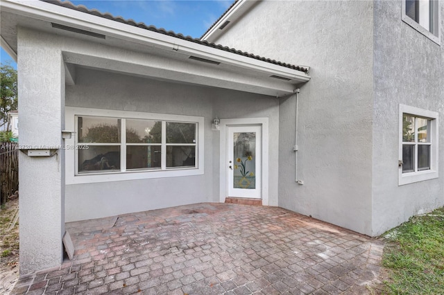 7459 NW 17th Dr, Pembroke Pines, FL 33024 - rear view of house with a patio area and stucco siding