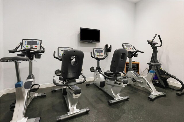 7459 NW 17th Dr, Pembroke Pines, FL 33024 - exercise room with baseboards
