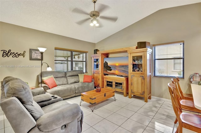 5911 Epsom Ln, Davie, FL 33331 - living room featuring a ceiling fan, lofted ceiling, and light tile patterned floors