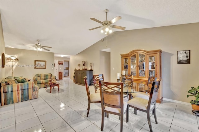 5911 Epsom Ln, Davie, FL 33331 - dining room with ceiling fan, light tile patterned floors, vaulted ceiling, and baseboards