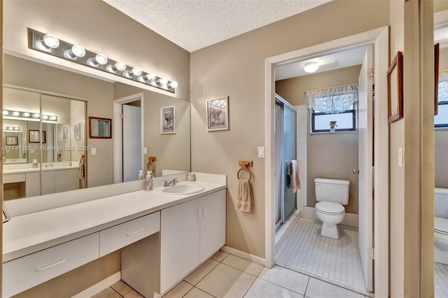 5911 Epsom Ln, Davie, FL 33331 - full bath with toilet, a shower stall, tile patterned floors, vanity, and baseboards