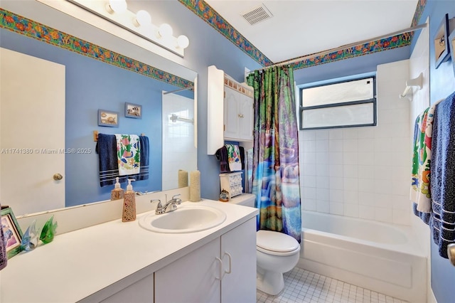 full bathroom featuring tile patterned flooring, shower / bath combo, vanity, and toilet